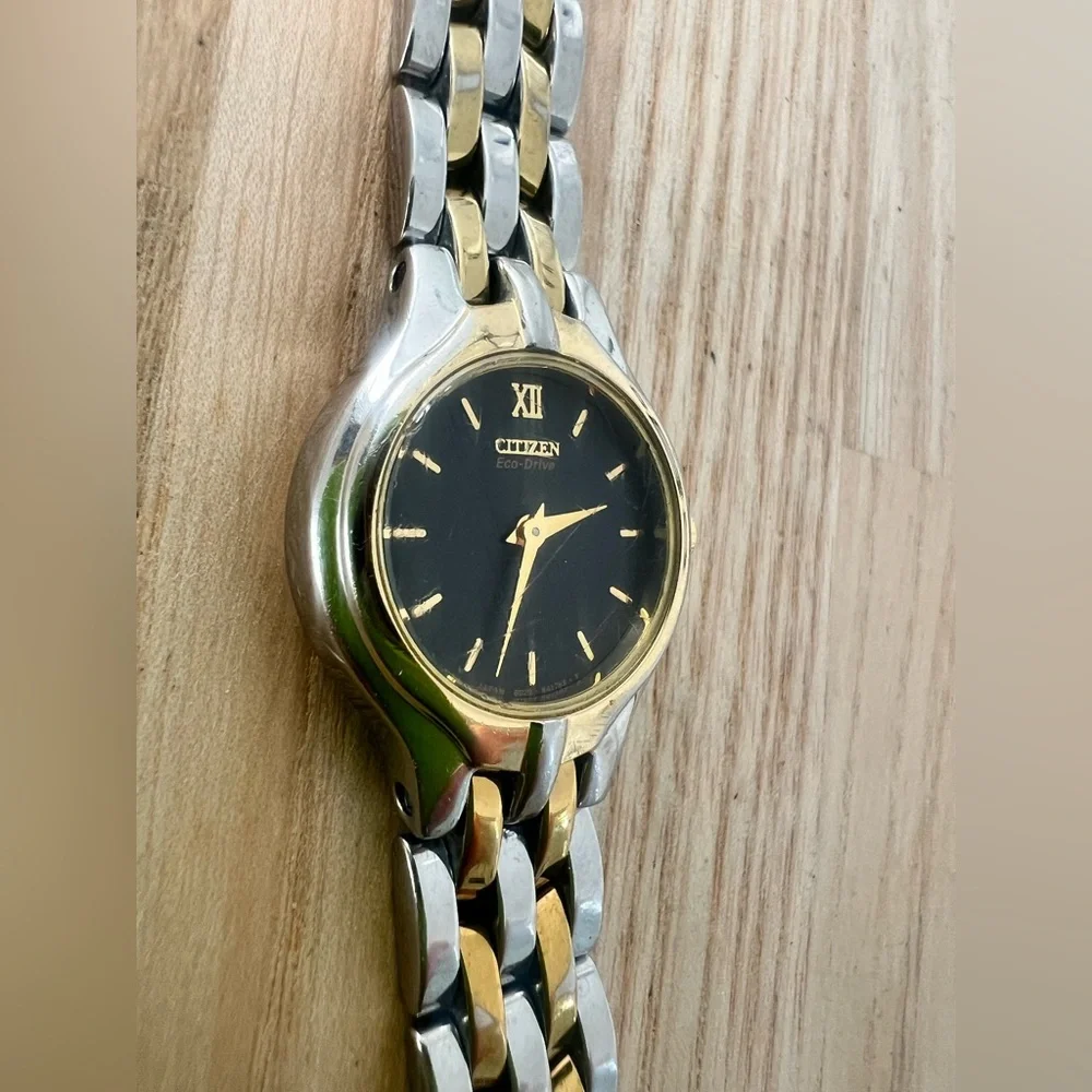 Citizen eco-drive ladies black dial two toned solar dress watch